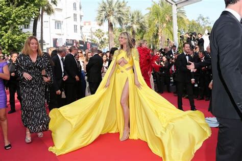 Heidi Klum Suffers Wardrobe Malfunction As She Ditches Underwear In Risky Yellow Dress