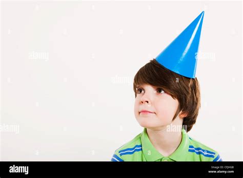 Boy Wearing A Party Hat Stock Photo Alamy