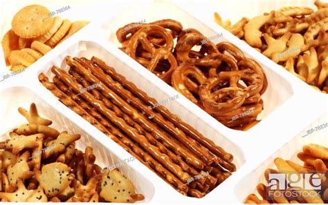 Salty Snacks Assorted Crackers And Pretzels Stock Photo Picture And