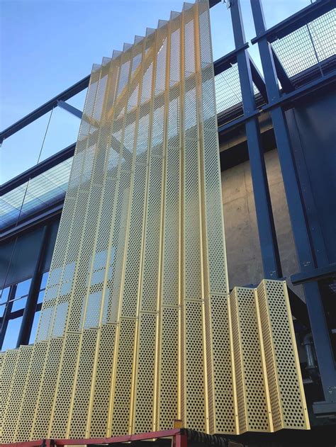 Perforated Metal Façade By Louvreclad The Gold Powdercoat Finish Makes