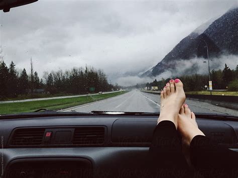 Girls Feet On Dashboard Of Car Del Colaborador De Stocksy Pink House