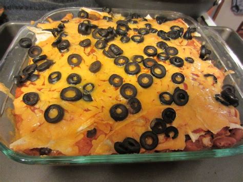 Cover and cook low for 6 hours. Chicken Enchilada Casserole made with corn tortillas, red ...