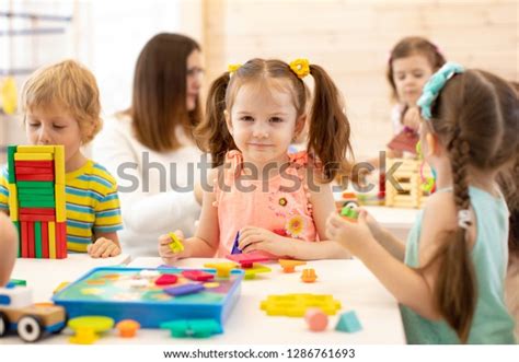 Group Preschool Children Playing Colorful Didactic Stock Photo