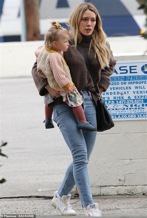 hilary duff cuts a winter chic look in as she steps out with daughter banks daily mail online