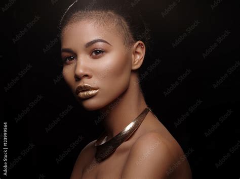 Fashion Portrait Of A Beautiful Naked African American Woman With Perfect Smooth Glowing Skin