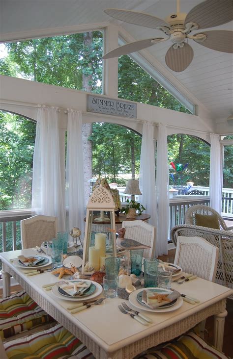 At dinner parties, forgo matched settings for ones that look thrown together on a whim. Seaside Tablescape | Beach house decor, Beautiful dining ...