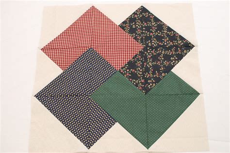 Bisect square on one diagonal. Card Trick Quilt Block Tutorial