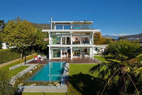 Sie möchten mehr über den aufbau eines flachdachs erfahren und wie es gebaut wird? HUF HAUS Modernes Fachwerkhaus Flachdach weiß Natur | Aura's