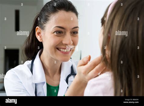 A Doctor Examining A Girls Glands Stock Photo Alamy