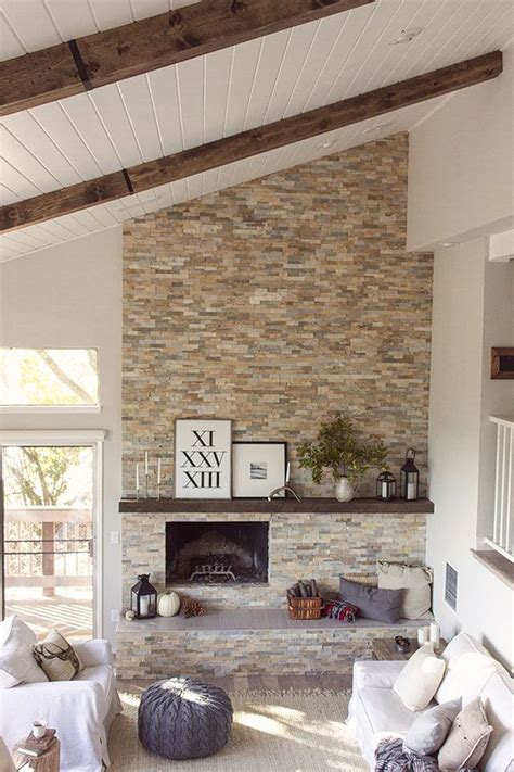 A spacious primary bedroom featuring white. Vaulted Ceilings - White or Wood | Living room with ...