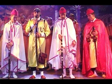 Gnawa music is a rich moroccan repertoire of ancient african islamic spiritual religious songs and rhythms. Moroccan Music & Dance - YouTube