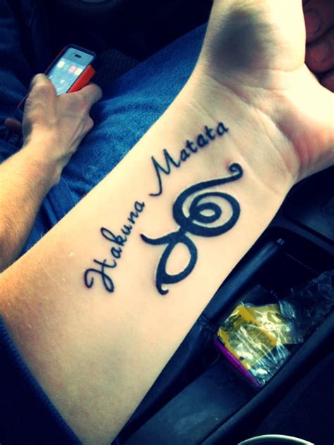 Small symbols are sometimes added to introduce a stylistic element to the design such as stars, hearts the two words can be split and introduced into two infinity symbols, or any other symbols or images, and placed on the wrists, ankles or another. Hakuna matata wrist tattoo