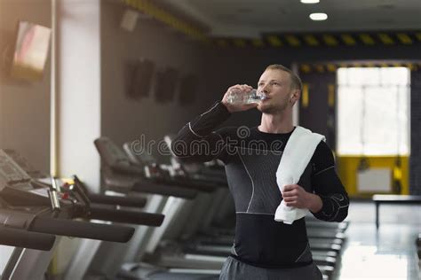 Male Bodybuilder Drinking Water After Workout Stock Image Image Of