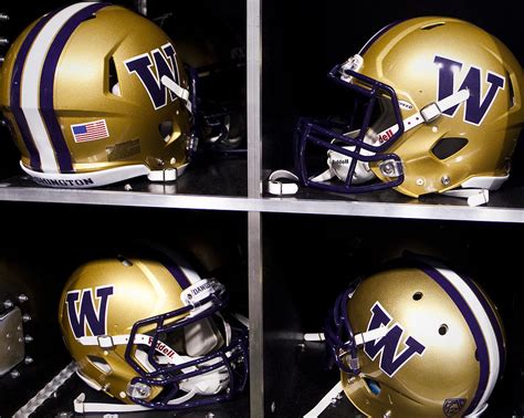 Washington Huskies Football Helmets Photograph By Replay Photos