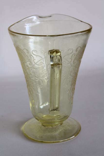 The cylinders bores were attached to the outer case at the 12, 3, 6 and 9 o'clock positions) for greater rigidity around the head gasket. vintage Florentine poppy pattern glass pitcher, amber ...