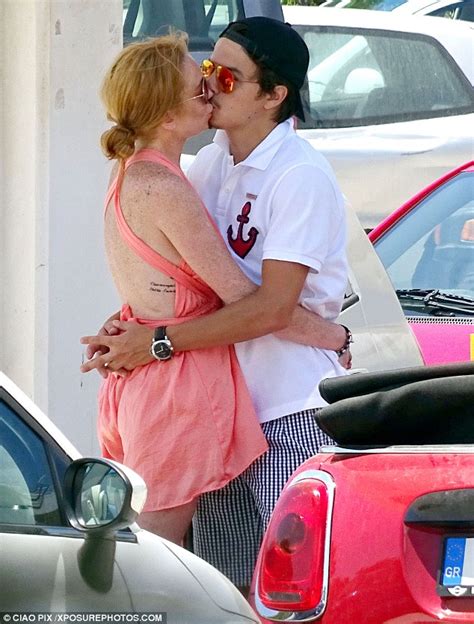 lindsay lohan kisses fiancé egor tarabasov in greece as the two continue their vacation daily