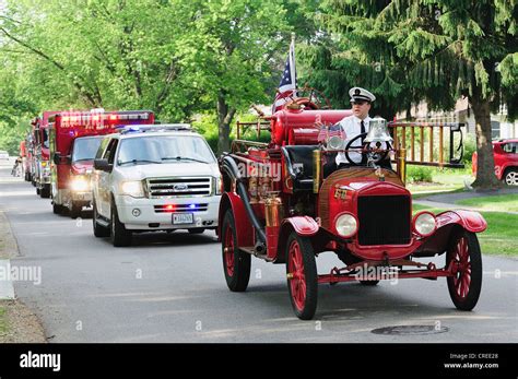 A Vintage 1923 Fire Engine From Small Town America Riding In The