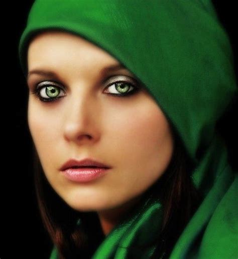 She slammed down her own knife and fork; The emerald green scarf around her face perfects the cool ...