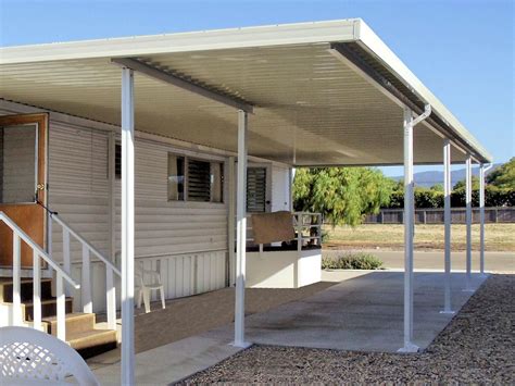 A Aluminum Patio Covercarport With Concrete Patio On One Side To Park