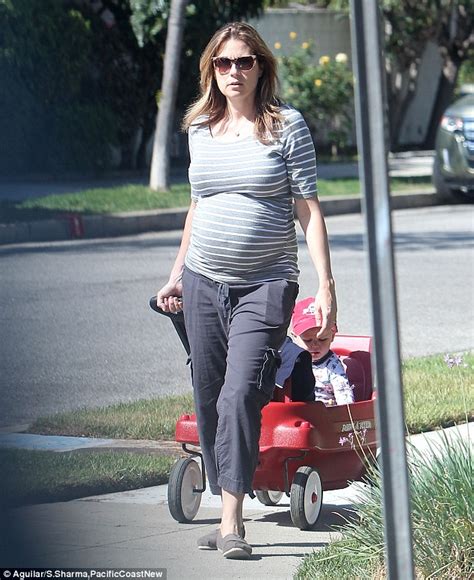 Jenna Fischer Shows Off Her Blooming Baby Bump As She Wheels Her Son