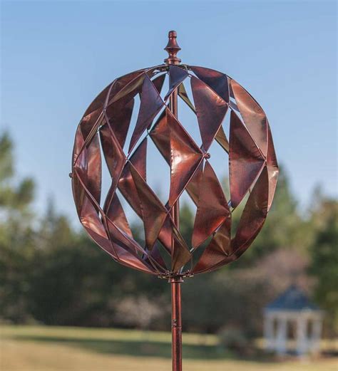 Our Unique Harlequin Ball Wind Spinner Features Pieced Metal Triangles