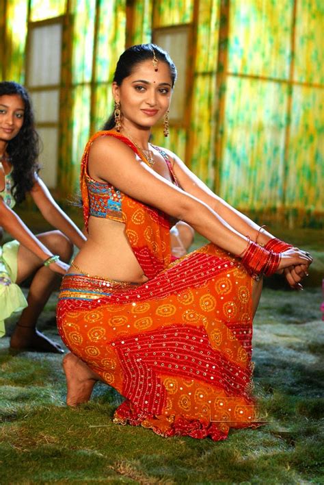 Anushka Shetty Hot Hip Navel Show In Orange Lehenga Choli Anushka Shetty