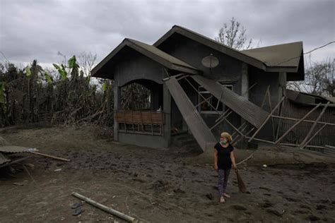 Cracks spotted in earth and more quakes spark fear of huge explosion as police extend blockade. Taal volcano: IMMINENT eruption possible as Philippines ...