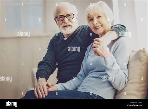 Pleasant Senior Man Hugging His Wife Stock Photo Alamy