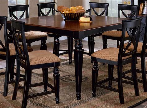 Incorporating a touch of european influence with its scrolled metal accents, the glambrey dining room counter table mixes various textural elements and rich earth tones in a way that's so pleasing to the palette. Hillsdale Northern Heights Counter Height Dining Table ...