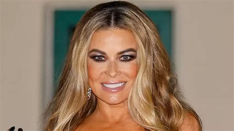 Carmen Electra Looks Busty In A Sheer Black Dress As She Hosts Event