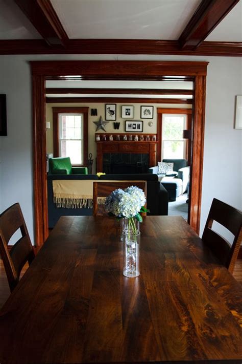 I prefer neutrals, off whites, light or dark grays (depending on how much light the home gets) or jewel tones in the blue/green or even purple family. Decorating with wood trim