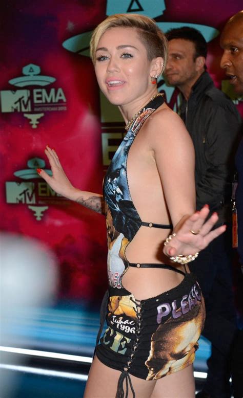 Miley Cyrus Wears A Low Hanging Backless Outfit At MTV Europe Music