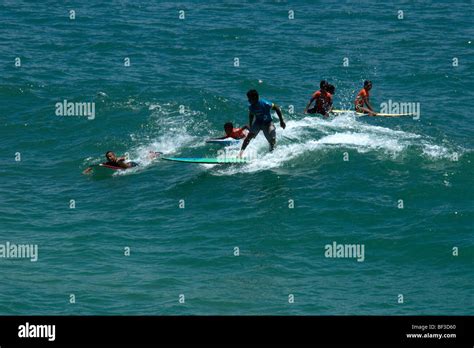 Surfers On Copacabana Beach Rio De Janeiro Brazil Stock Photo Alamy