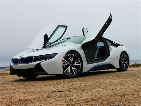 Offered as a futuristic coupe or sleek roadster, the i8's performance easily matches its stunning good looks. The BMW i8 is the sports car of the future, and we drove ...