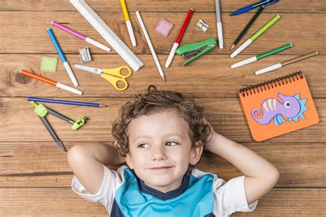 Child Surrounded By School Supplies Stock Image Image Of Preschooler