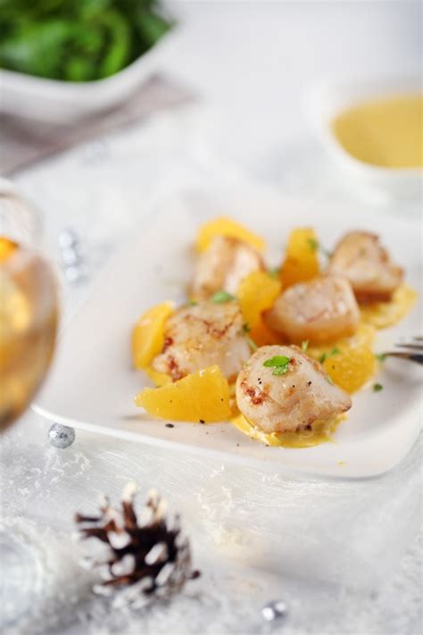 Noix de Saint-Jacques à lorange sauce safran et cognac