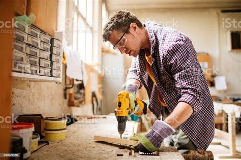 Carpenter At Work Stock Photo - Download Image Now - iStock