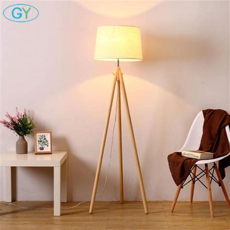 Living rooms require natural lighting and if this is not possible, then you can use some unique artificial lighting fixtures to light up your place. Industrial Tripod Floor Lamp Linen Beige Fabric lampshade living room standing Lights bedroom ...