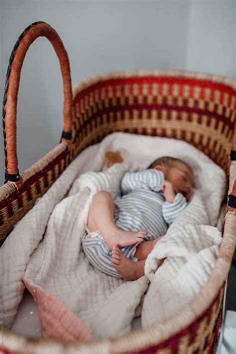 Newborn Baby Sleeping In A Bassinet Del Colaborador De Stocksy Treasures Travels Stocksy