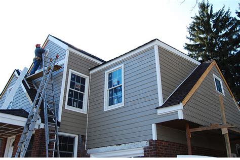Cement board is necessary to provide a stable surface for the ceramic tile to be installed upon. Fiber cement board siding installation | Flickr - Photo ...