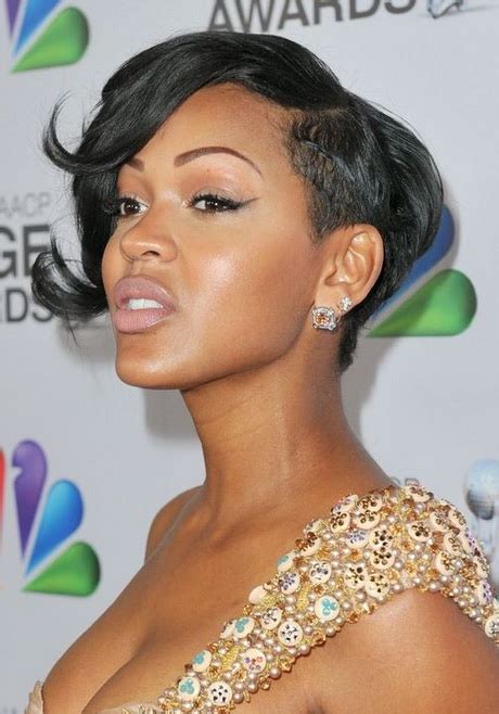Cut your hair into a blunt bob and style the bottom hair into soft waves. Short tapered haircuts for black women