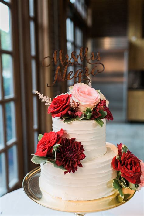 See more ideas about cake, two tier cake, tiered cakes. Two-Tier Buttercream Cake with Red Flowers