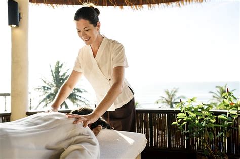 Female Massage Therapist Giving A Massage Photo Rawpixel