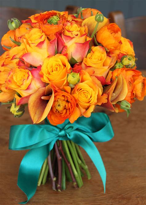 Artificial wedding bouquets silk bridal bouquet. Divine bouquet of orange ranunculas, roses and lilies with ...