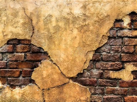 Cracked Old Vintage Brown Concrete Wall With Brick Background Texture