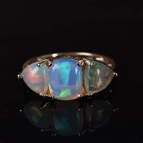 275 Ct Ethiopian Welo Opal Trilogy Ring In 9k Gold M3592931 Tjc