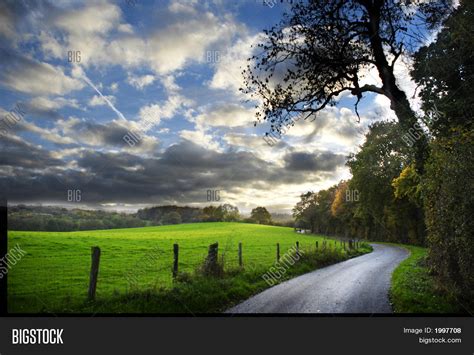 Country Road In English Countryside In Autumn Stock Photo And Stock