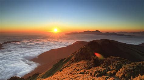 Wallpaper High Altitude Mountain Sunrise Floating Clouds Sun