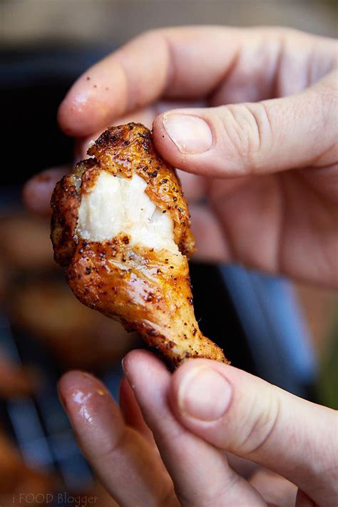 Season wings with salt and pepper. These air fryer chicken wings are extra crispy on the ...