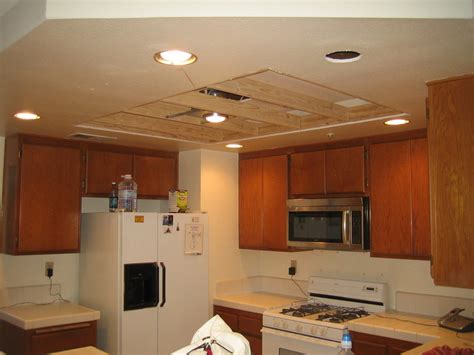 It involves removing the old fixtures, installing the recessed lights, and repairing any ceiling damage left over from the old light fixtures. Updating look of recessed fluorescent fixtures ...